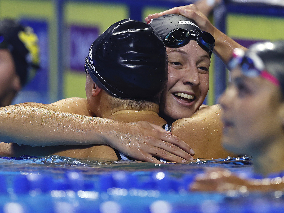 Brooke Forde embraces Katie Ledecky after competing in the Women's 200m freestyle final of the 2021 U.S. Olympic Team Swimming Trials.